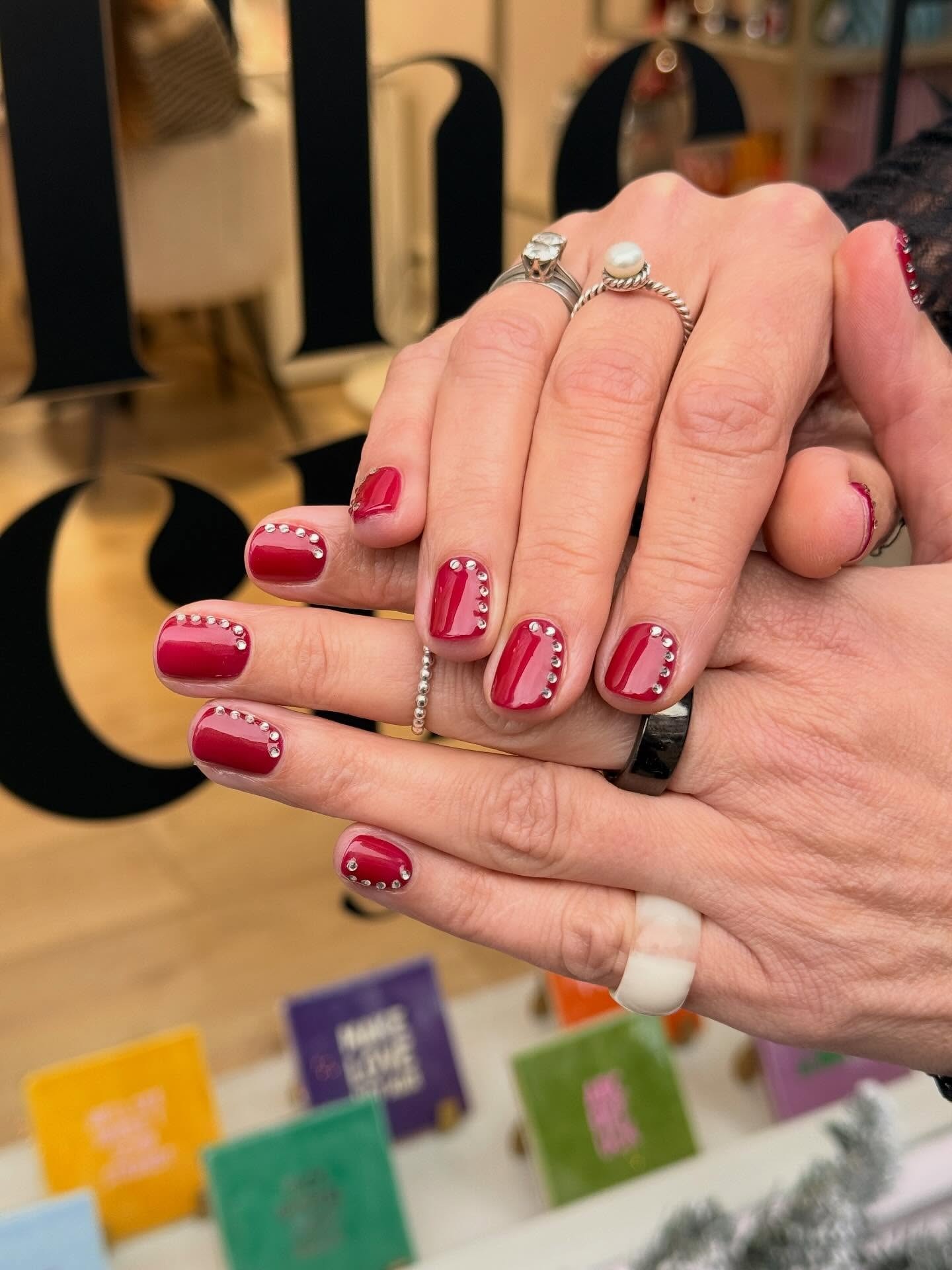 Red nails with rhinestones