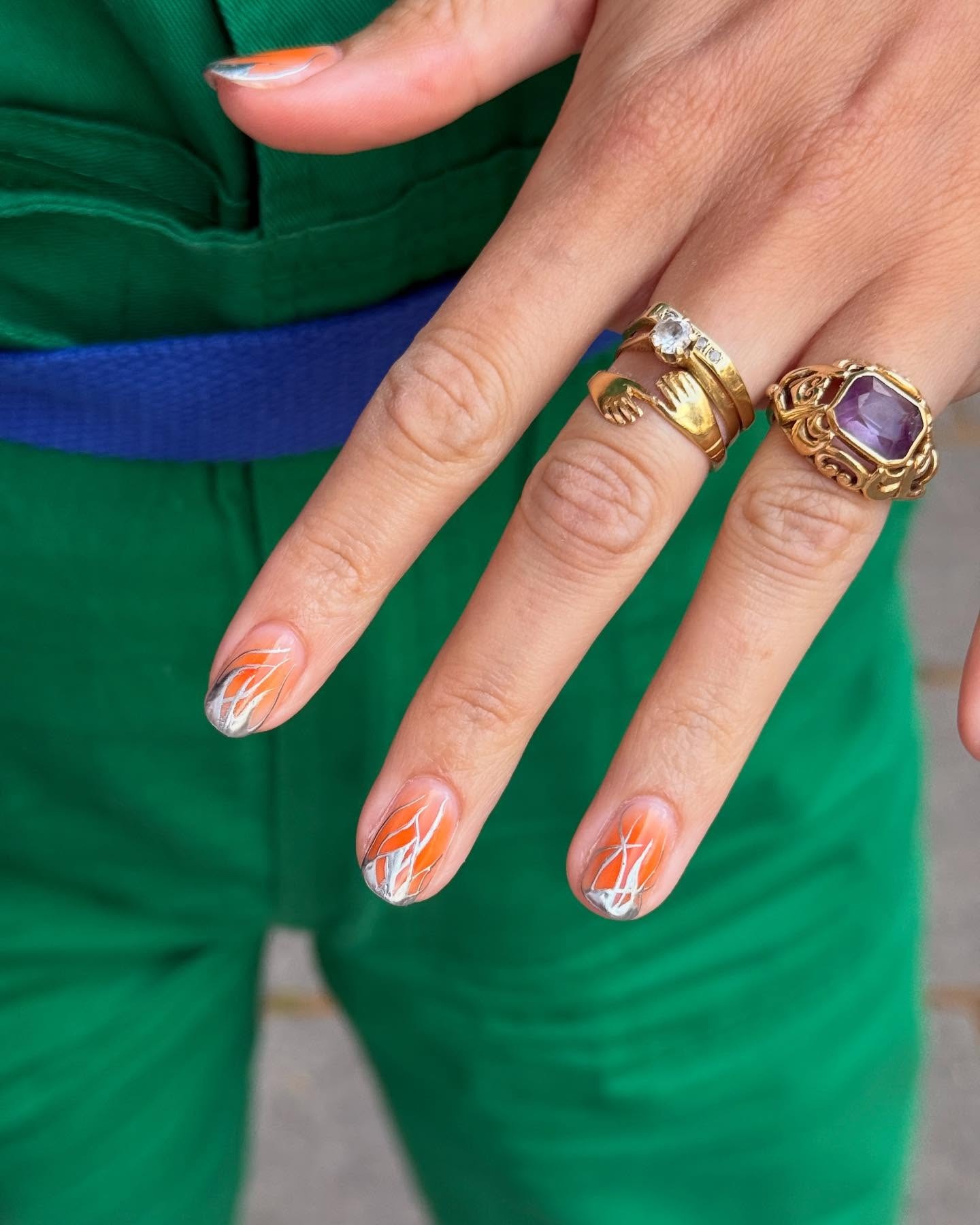 Orange silver nail art
